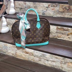 Louis Vuitton Alma - Vachetta Redone in Tiffany Blue.
